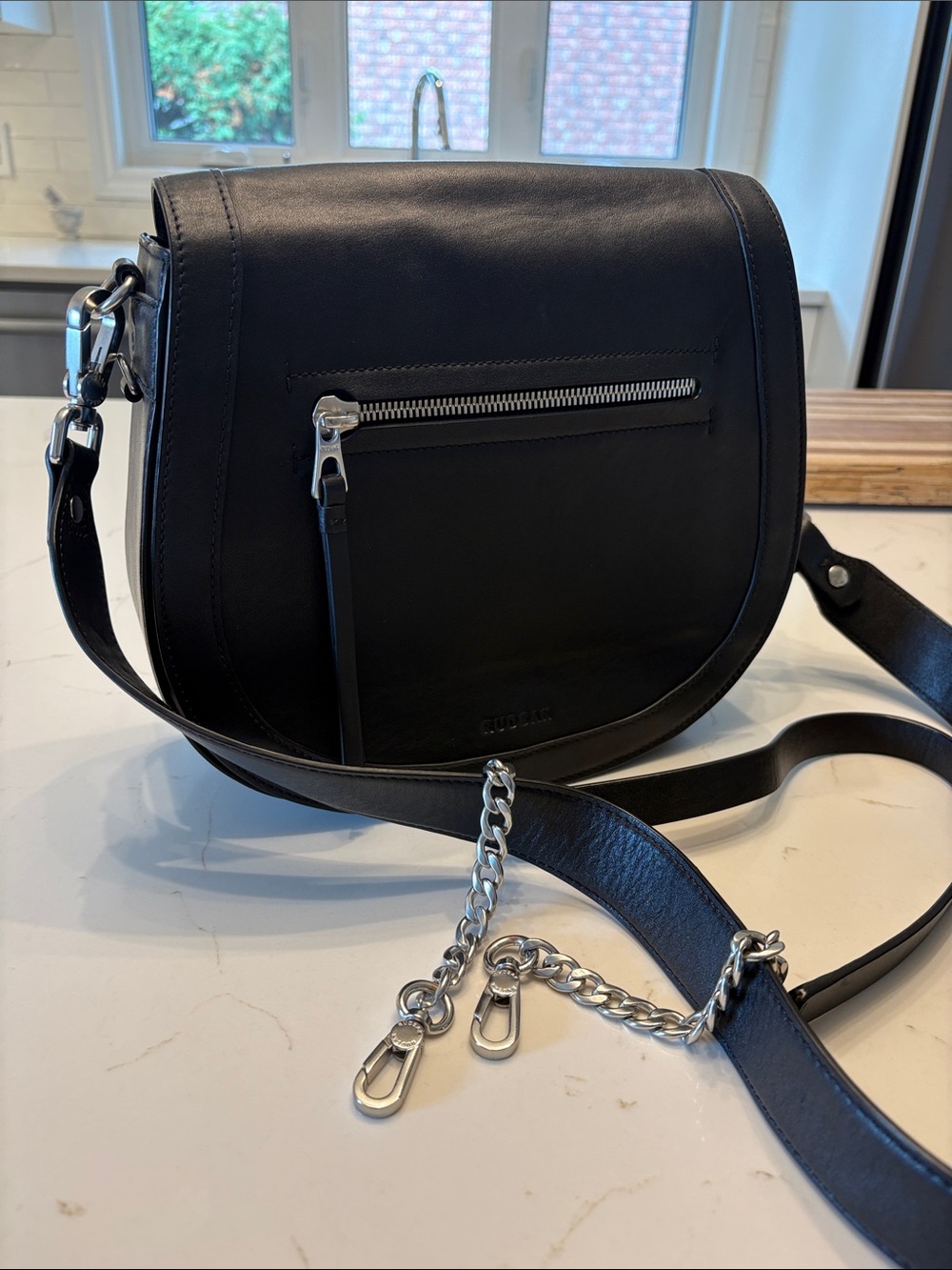 RUDSAK Black Leather Saddle Crossbody with Silver Chain